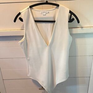 Good American scuba shaping cream colored deep v neck bodysuit in L